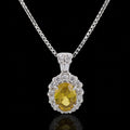 14KT White Gold Oval Sphene Pendant with Diamond Halo